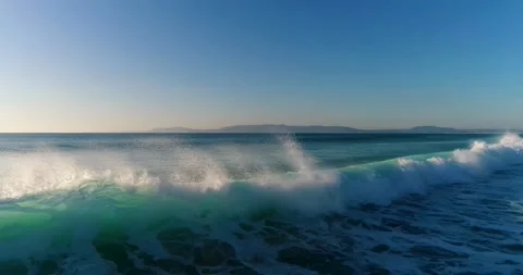 Aerial view of waves breaking at the Comporta Beach Stock Footage 130970062