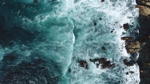 Aerial view of waves breaking Stock Footage 109136076