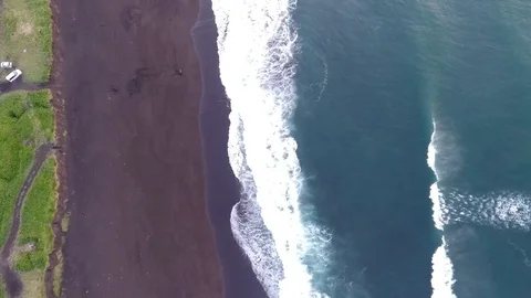 Aerial view of waves breaking on sandy beach. Stock-Footage 104198812