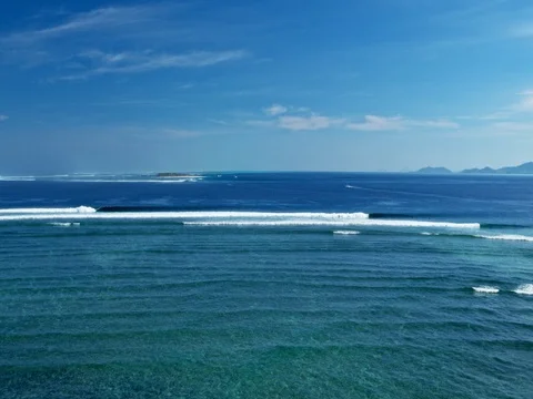 Aerial View of Waves Breaking on Tropical Island Stock Footage 71369462