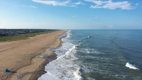 Aerial View of Waves Breaking at the Virginia Beach Oceanfront North End Stock Footage 329654355