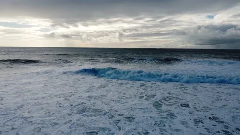 Aerial View of Waves at Costa da Caparica beach, Portugal Stock Footage 145919493
