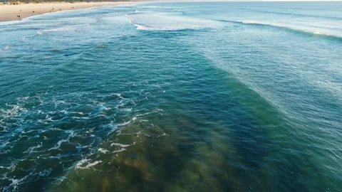 Aerial View of Waves at Costa da Caparica beach, Portugal Stock Footage 145974962