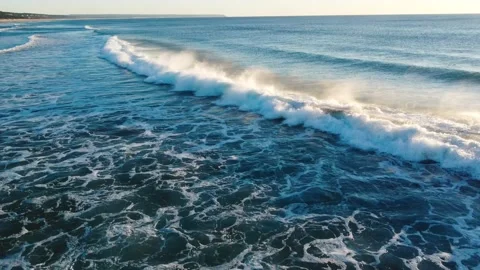 Aerial View of Waves at Costa da Caparica beach, Portugal Stock Footage 145974992