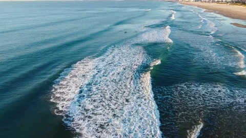 Aerial View of Waves at Costa da Caparica beach, Portugal Stock Footage 145975065