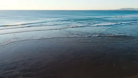 Aerial View of Waves at Costa da Caparica beach, Portugal Stock Footage 145975146