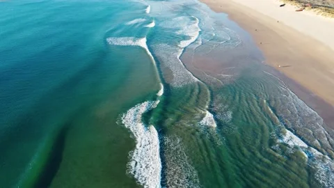 Aerial View of Waves at Costa da Caparica beach, Portugal Stock Footage 145975158