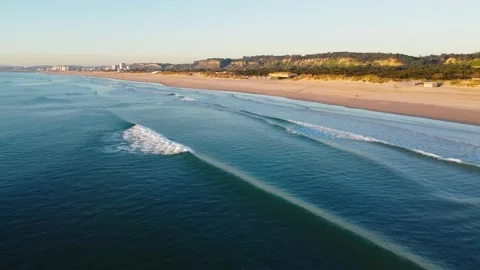 Aerial View of Waves at Costa da Caparica beach, Portugal Stock Footage 146101703