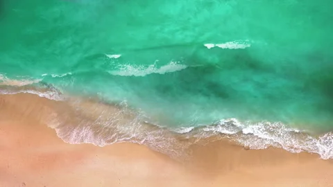 Aerial View Of Waves Crashing On Beach In Real Time, Drone footage Stock Footage