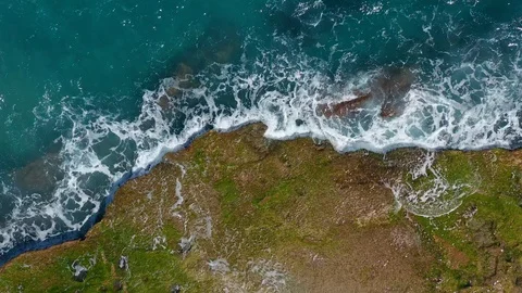 Aerial view. Waves crashing on rocks. Stock Footage 112670287