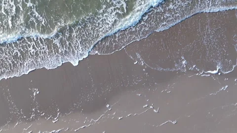 Aerial View of Waves Crashing on Sandy Beach, North Sea, Winter, Netherlands Stock Footage 285074580