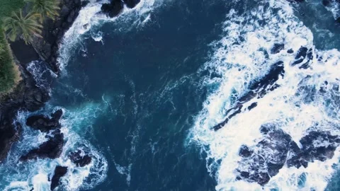 Aerial view of waves crushing on the rocks at island of Maui, Hawaii Stock Footage 276811068