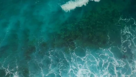 Aerial view of waves foam and seabed 스톡 동영상 73360880