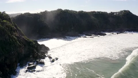 Aerial view of waves hitting at hidden beach during day, Itajaí, Brazil Stock Footage 158574355
