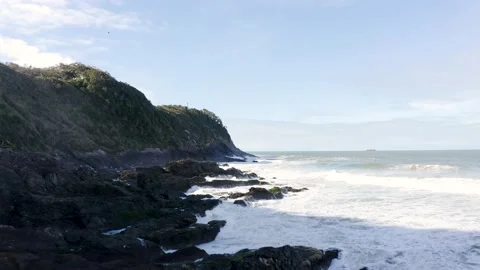 Aerial view of waves hitting at hidden beach during day, Itajaí, Brazil Stock Footage 158574381