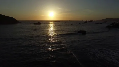 Aerial View of Waves Lapping On The Shore At Sunset 스톡 동영상 71156741