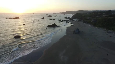 Aerial View of Waves Lapping On The Shore At Sunset 스톡 동영상 71158989