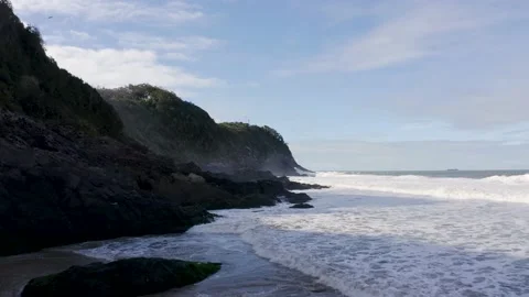 Aerial view of waves at the lonely beach, Itajaí, Brazil Stock Footage 158574310