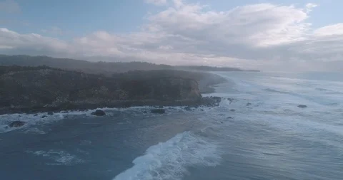 An aerial view of waves on the point of Gillespie Beach on the West Coast of New Stock Footage 100133521