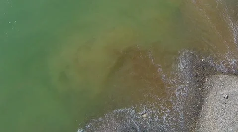 Aerial View of waves on seashore Stock Footage 60603431