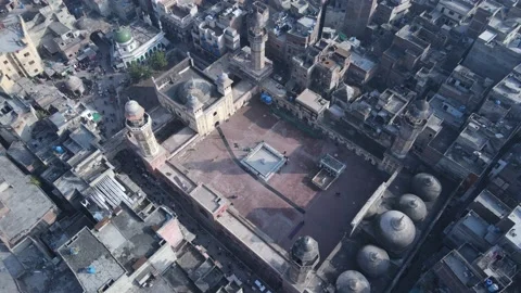 Aerial view of Wazir Khan mosque in Dehli Gate walled city of Lahore, Pakistan Stock Footage