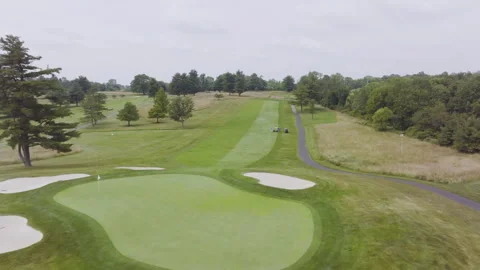 Aerial View Of Well Maintained Golf Course On An Overcast Day Stock Footage 295314561