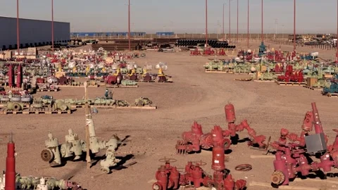 Aerial view of wellhead equipment yard in oil and gas industry Stock Footage 329018294