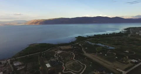 Aerial view of wetland plain lake scenery around lake in Dali Yunnan China Stock Footage 337921753