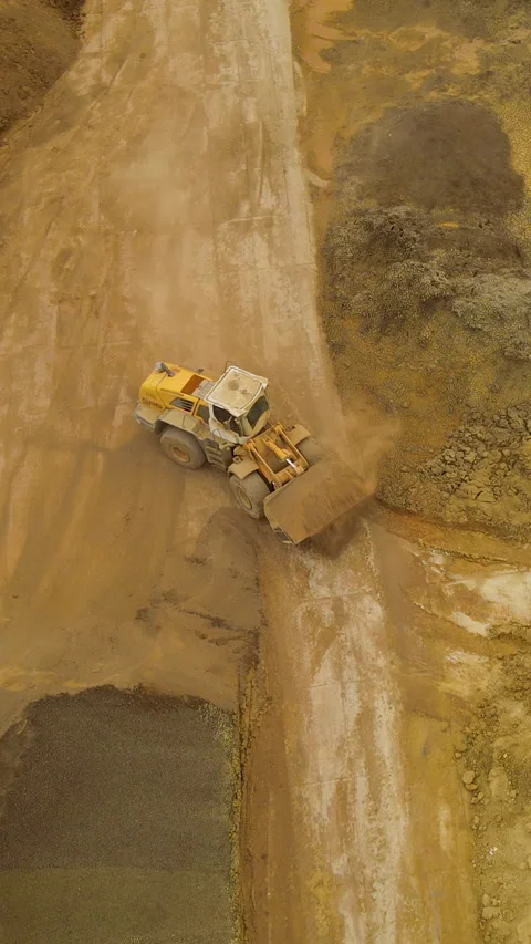 Aerial View Of Wheel Loader Moving Earth At Construction Site Stock Footage 333363012