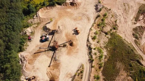 Aerial view at wheel loader transports sand in a sand quarry Stock Footage 163375406
