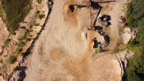 Aerial view at wheel loader transports sand in a sand quarry Stock Footage 163376059