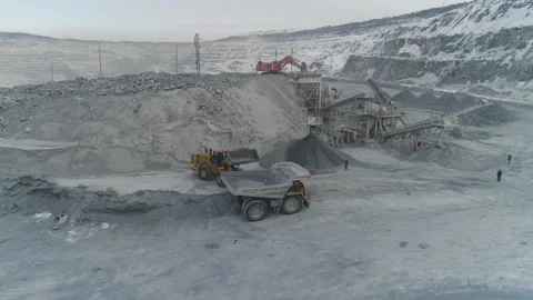 Aerial view of Wheel loader, truck and conveyors in a quarry Stock Footage 216956072