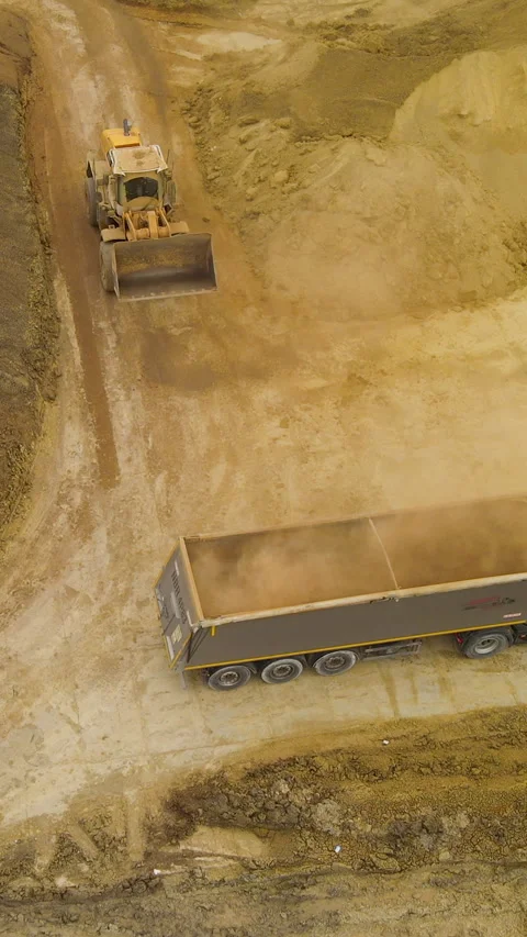 Aerial View Of Wheel Loader Working At Construction Site Quarry Stock Footage 333363197