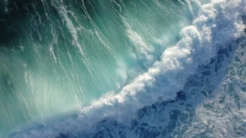Aerial view of white big waves on the ocean. Video stock 219795184