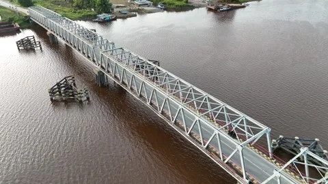 Aerial view of white bridge spanning river Stock Footage 327213310