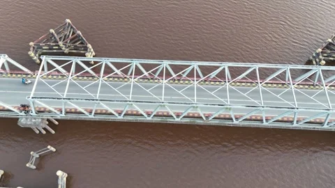 Aerial view of white bridge spanning river Stock Footage 327214037