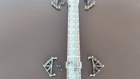Aerial view of white bridge spanning river Stock Footage 327214041