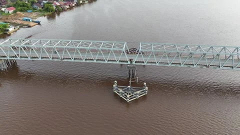 Aerial view of white bridge spanning river Stock Footage 327214252