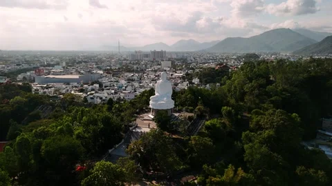 Aerial view of white buddha statue at long son pagoda, landscape of nha tra.. Video stock 335018609