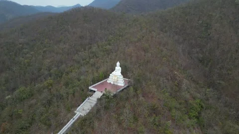 Aerial View of White Buddha Statue on Mountain Top in Pai, Mae Hong Son, Stock Footage 335600463