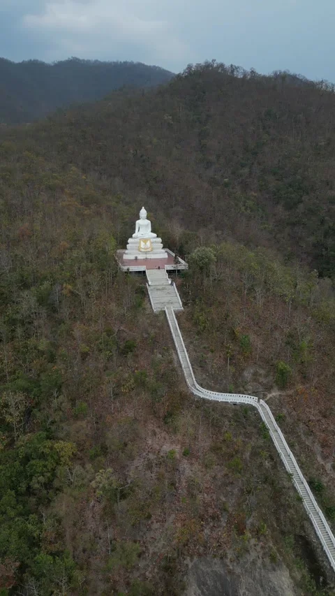 Aerial View of White Buddha Statue on Mountain Top in Pai, Mae Hong Son, Stock Footage 335600607