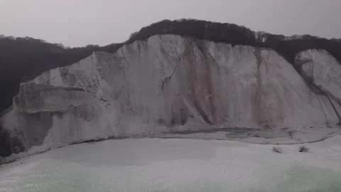 Aerial View of White Chalk Cliffs and Baltic Sea in Mist Stock Footage 343533242