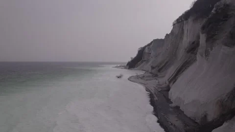 Aerial View of White Chalk Cliffs and Baltic Sea in Mist Stock Footage 343533338