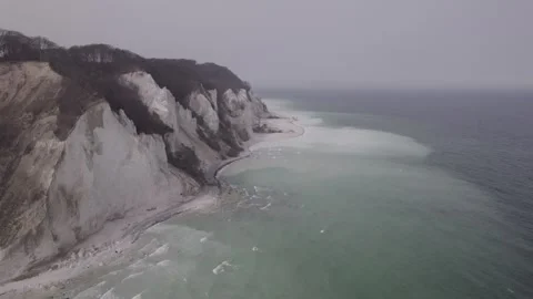 Aerial View of White Chalk Cliffs and Baltic Sea in Mist Stock Footage 343533389