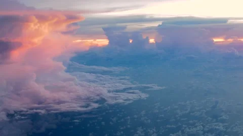 Aerial view of  white clouds on blue sky on sunrise with reflection in ocean Stock Footage 65005074