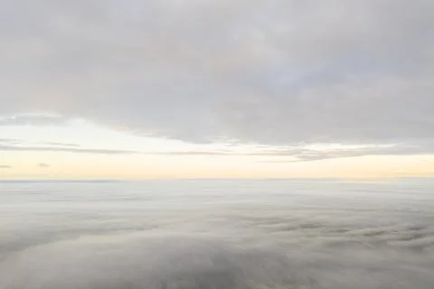 Aerial view white clouds. View from drone. Aerial top view cloudscape textu.. Stock Photos