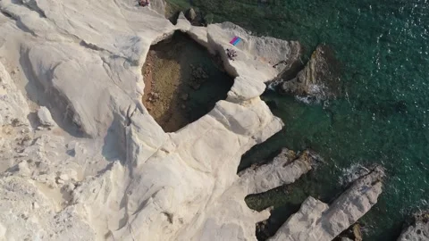 Aerial view of white coastal cliffs and sea caves in Cyprus. Stock Footage 346390103