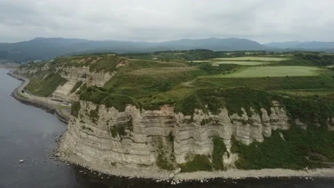 Aerial view of the white columnar joint cape and coastline. Video stock 160402749