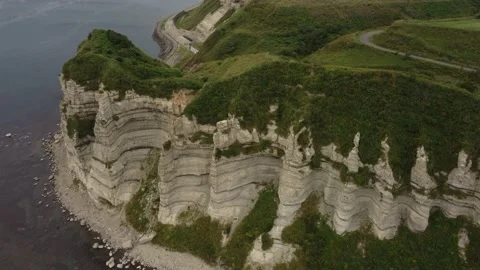 Aerial view of the white columnar joint cape and coastline. Video stock 160403150