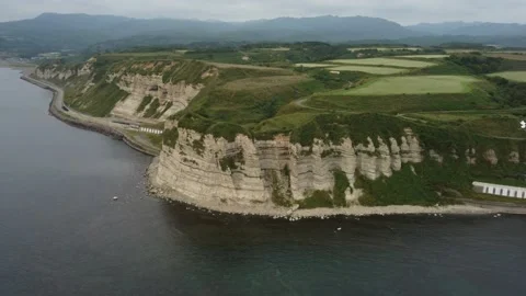 Aerial view of the white columnar joint cape and coastline. Video stock 160403314